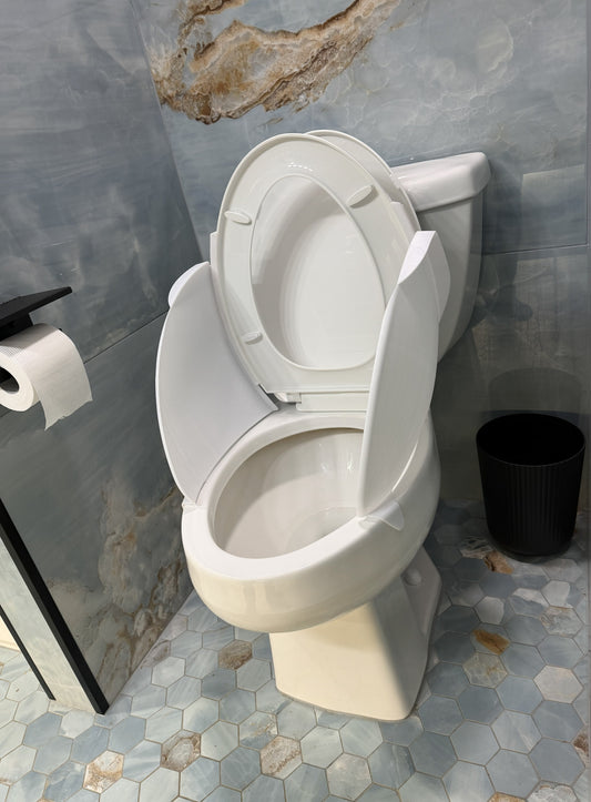 Number One Defender installed on an elongated toilet with the seat raised