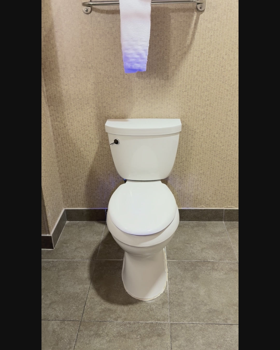Black light video revealing urine splash in a clean hotel bathroom